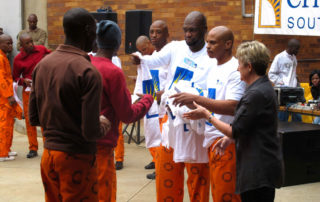 Criminon South Africa Supervisors handing out Criminon T-shirts