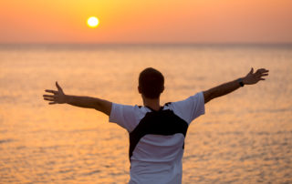 Young man enjoying sea and happiness