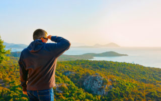 Man is looking at the sea