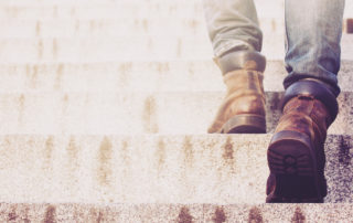 Man walking up the stairs