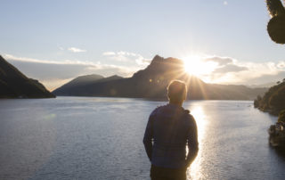 Man looks off to distant scene