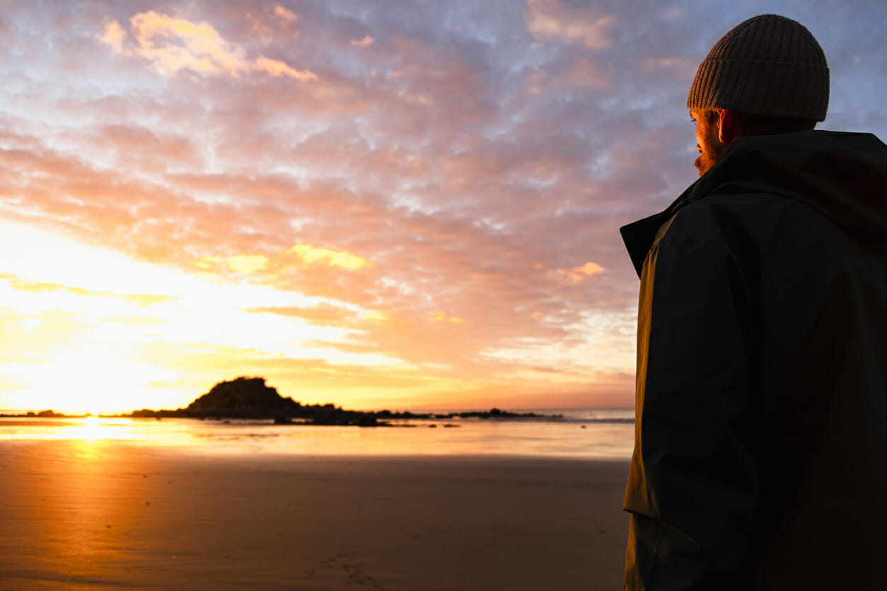 Man looking at the sunset.