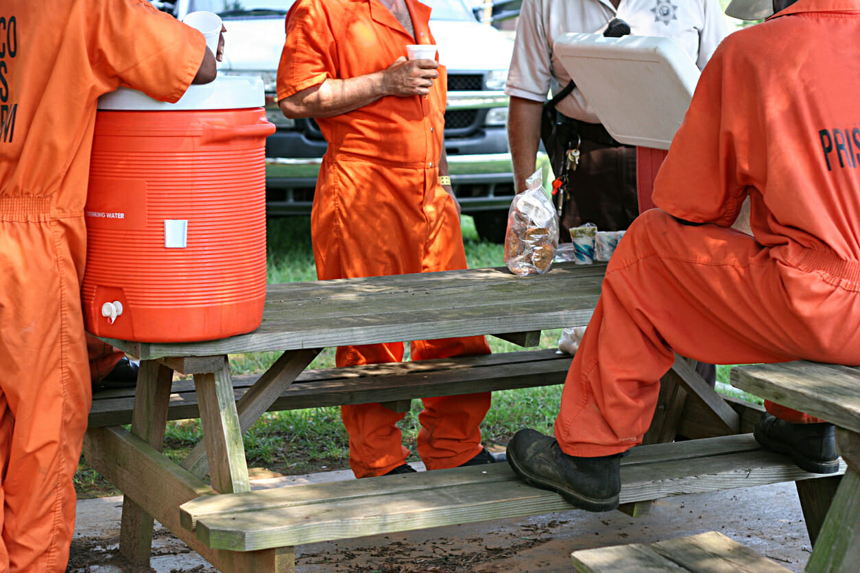 Inmates taking a break from community service work