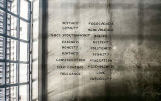Prison wall with Precepts to live by