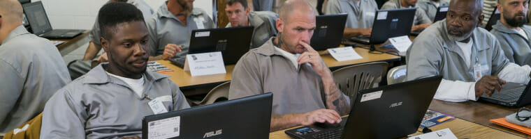 Inmates learning computer skills
