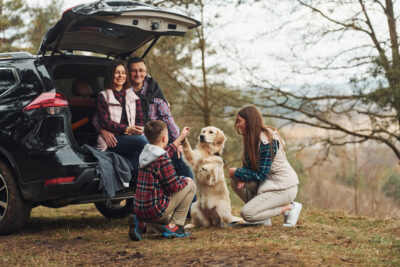 Happy family having fun outside in nature.