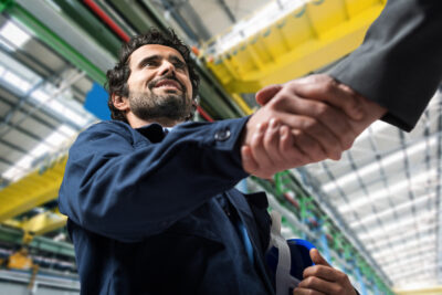 New worker shaking hand