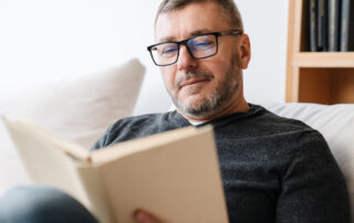 Man reading a book.