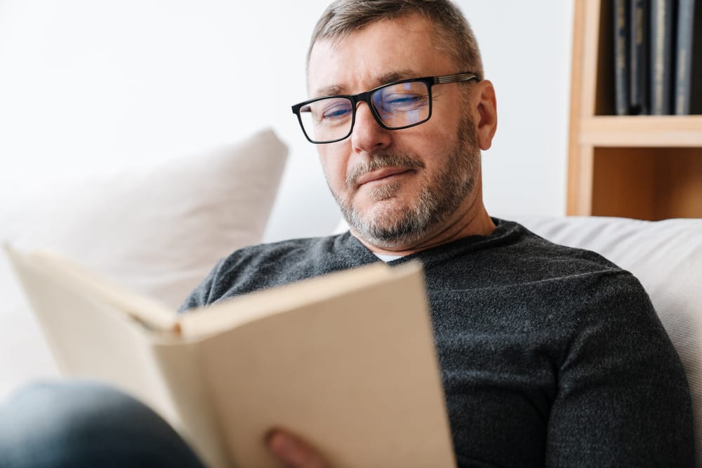 Man reading a book.