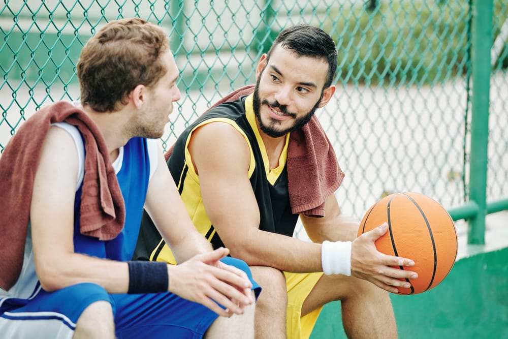 Two basketball friends talk